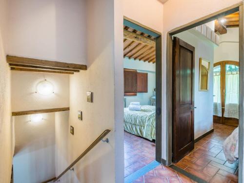 Postel nebo postele na pokoji v ubytování Holiday Home Badia a Passignano by Interhome