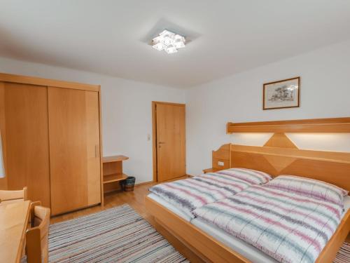 Katil atau katil-katil dalam bilik di Apartment Bergblick by Interhome