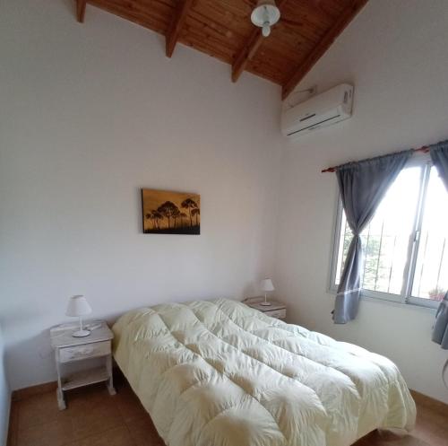 Ένα ή περισσότερα κρεβάτια σε δωμάτιο στο Casita Las Acequias