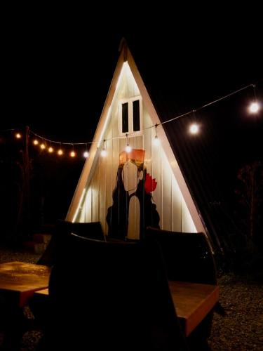 a play tent with a dress on it at night at The Heavens Place in Nagar