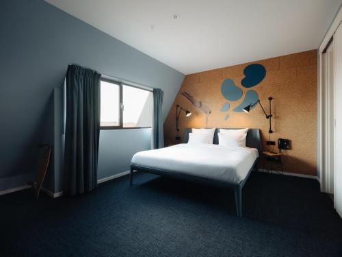 Conscious Hotel The Tire Station Image