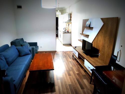A television and/or entertainment centre at Mimoza İstiklal Apart Hotel
