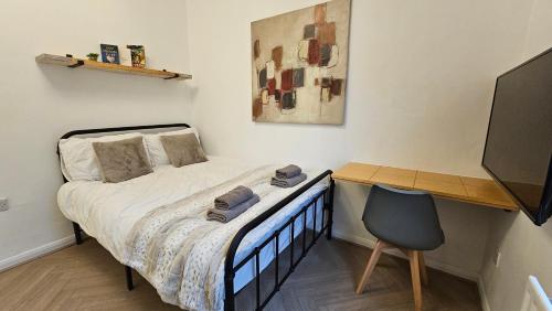 Postel nebo postele na pokoji v ubytování Newly renovated Studios & Ensuite Rooms! - Camberwell