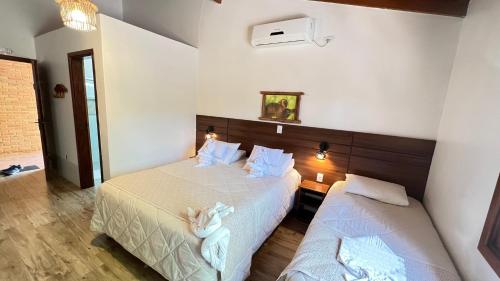 Katil atau katil-katil dalam bilik di Hotel Cabanas