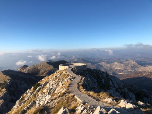 a winding road on top of a mountain at Ethno House Ivanovic in Virpazar