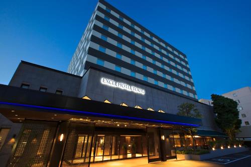 a building with a sign on the front of it at Matsue Excel Hotel Tokyu in Matsue