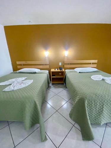 Katil atau katil-katil dalam bilik di Hotel San Bernardino