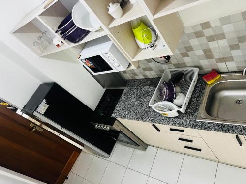 Kuchyň nebo kuchyňský kout v ubytování Gianas stays with pool