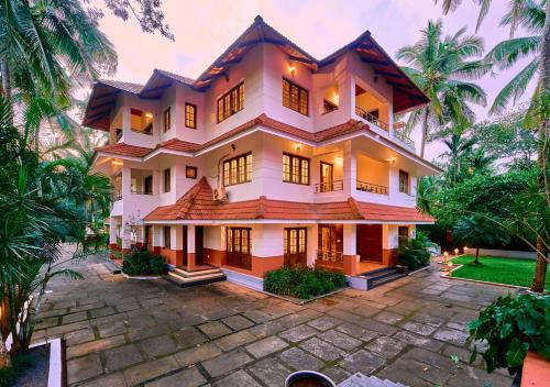 an image of a house at Ushasree Wayanad Pool Resort by VOYE HOMES in Ambalavayal