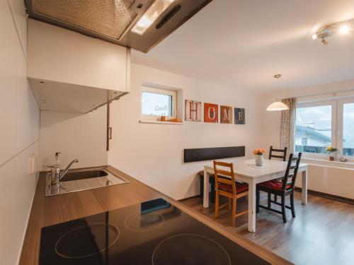 Kuchyň nebo kuchyňský kout v ubytování Holiday Home Landhaus St- Georg-9 by Interhome
