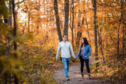 a man and a woman walking down a path in the woods at Holiday Inn Express - Strathroy by IHG in Strathroy