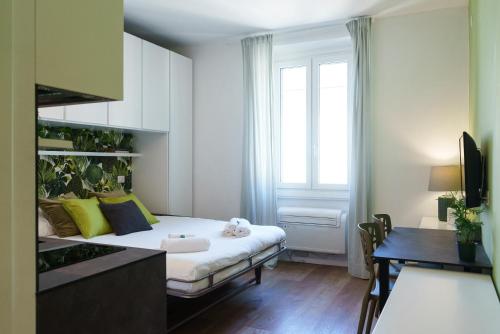 Posteľ alebo postele v izbe v ubytovaní Area Milano Apartments - Tadino 17 close to Central Station