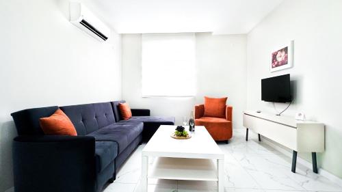 Lara Smart Apartsにあるテレビまたはエンターテインメントセンター