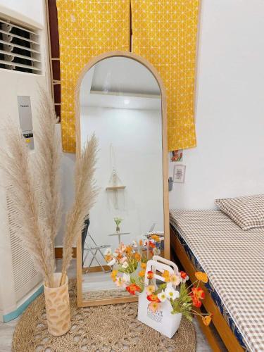 Postel nebo postele na pokoji v ubytování MinhomestayHaiPhong