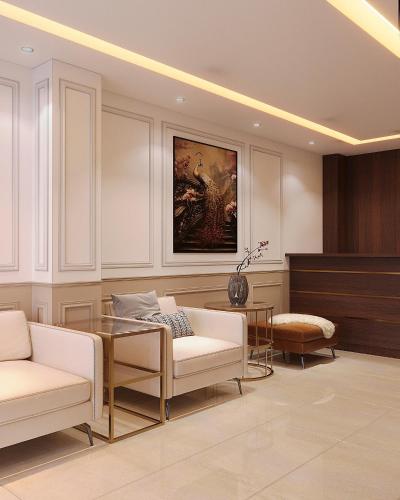 a living room with white chairs and a table at Astoria Hanoi Hotel & Travel in Hanoi