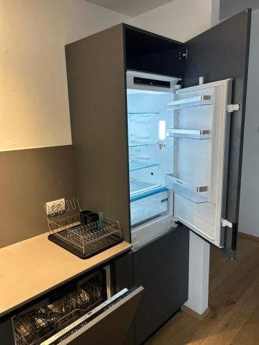 Dapur atau dapur kecil di AMIA rooms & wine