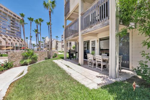 an exterior view of a house with a patio and grass at Bahia Mar Solare Beachfront Resort Condos with Two Pools in South Padre Island