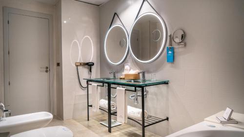 Koupelna v ubytování SOLYMAR Gran Hotel