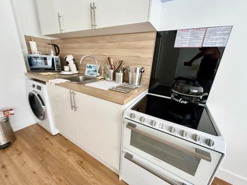 Η κουζίνα ή μικρή κουζίνα στο Studio hyper centre Trouville