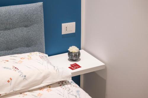 Una cama o camas en una habitación de Dimora Delle Vigne