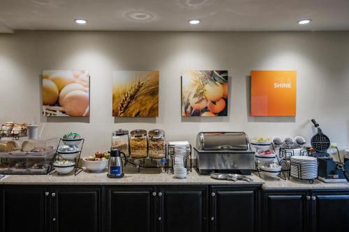 a kitchen with a counter with food on it at Comfort Inn - Gander in Gander