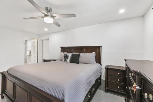 a bedroom with a bed and a ceiling fan at Bahia Mar Solare Beachfront Resort Condos with Two Pools in South Padre Island