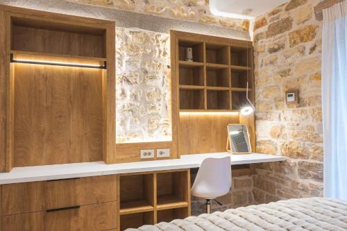 Ένα ή περισσότερα κρεβάτια σε δωμάτιο στο Adryades Luxry apartments Ioannina