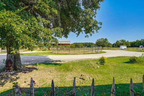 a park with a basketball hoop and a tree at Dog-Friendly Guest House on Horse Ranch in Azle! in Azle