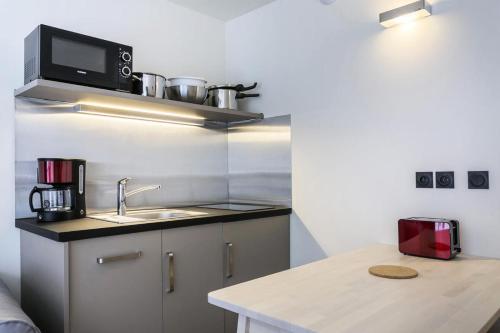 Photo de la galerie de l'établissement Résidence Bellecote - Studio 4 personnes pied des pistes MAE-2214, à Arc 1800