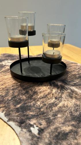 two glasses sitting on top of a table at Ferienwohnung Soest Lendringsen in Soest