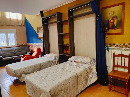 Ένα ή περισσότερα κρεβάτια σε δωμάτιο στο El Mirador de Clavijo