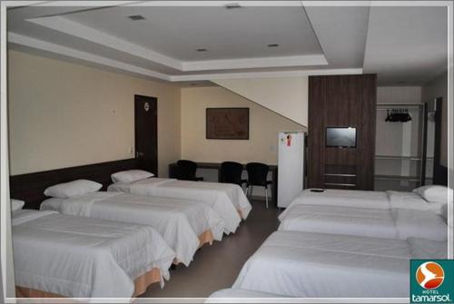 Un pat sau paturi într-o cameră la Hotel Tamarsol