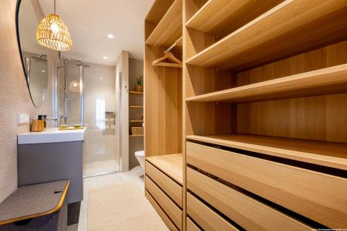 a bathroom with a shower and a toilet and a sink at Stylish family home in Los Gigantes in Santiago del Teide