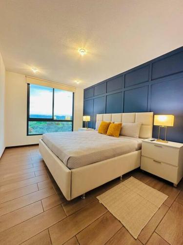 Postel nebo postele na pokoji v ubytování Tower View 360º