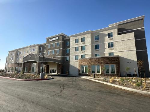 an empty parking lot in front of a hotel at Cambria Hotel El Centro - Imperial in El Centro
