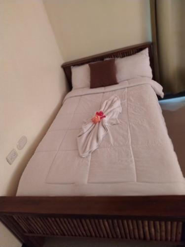 Una cama o camas en una habitación de Arenal Ginger Home
