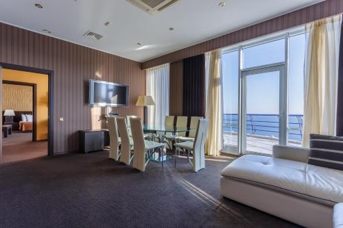 Postel nebo postele na pokoji v ubytování Stella Residence Club