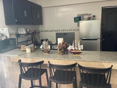 Kuchyň nebo kuchyňský kout v ubytování La Escondida Beach House