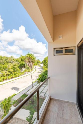 Balkón nebo terasa v ubytování Departamento 5, Tulum Country Home, con Muelle de Pesca, Club de Playa, Alberca, Cenote y Campo de Golf, Contrata Day Pass Bahia Principe