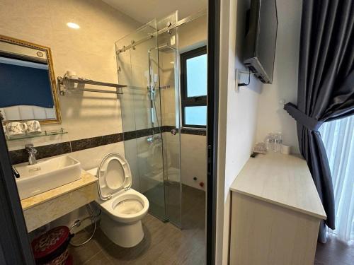 Koupelna v ubytování Anh Quan Khoi Hotel
