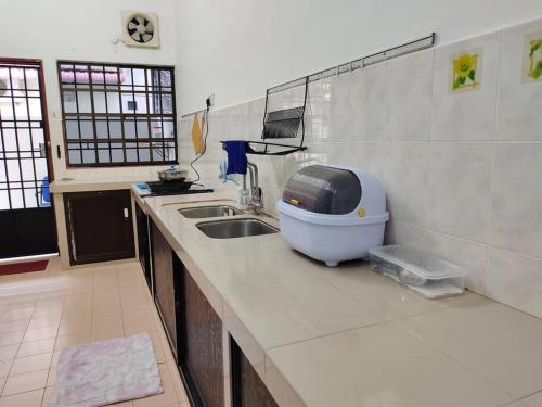 Η κουζίνα ή μικρή κουζίνα στο Yajju Homestay 雅居民宿