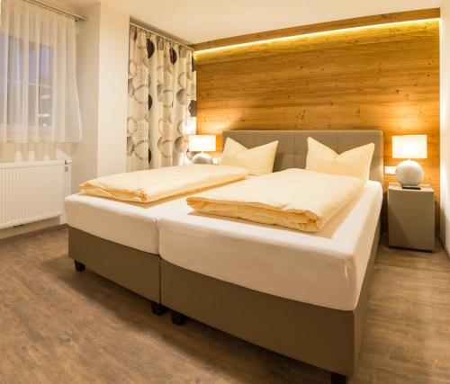 Ένα ή περισσότερα κρεβάτια σε δωμάτιο στο Brunner Apartments