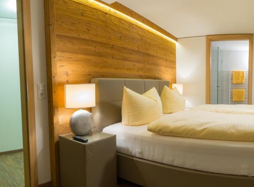 Ένα ή περισσότερα κρεβάτια σε δωμάτιο στο Brunner Apartments