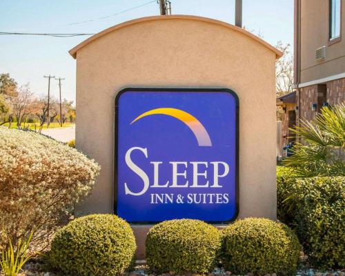 a sign for a sleep inn and suites at Sleep Inn & Suites at Six Flags in San Antonio