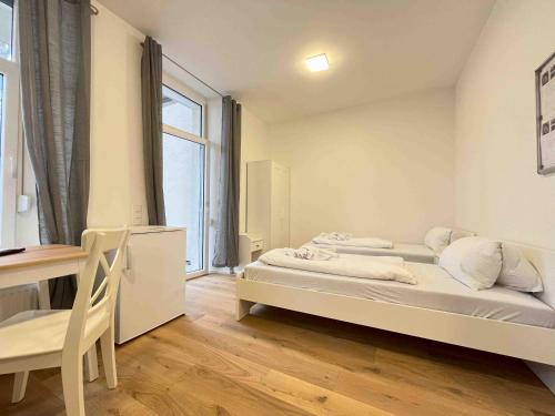 Postel nebo postele na pokoji v ubytování AM1026 - Smarte Monteurwohnung Übergangswohnung