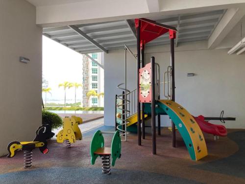 a play room with many different types of playground equipment at 23th 2BR1B Straits Garden Suites Georgetown Jelutong in Jelutong