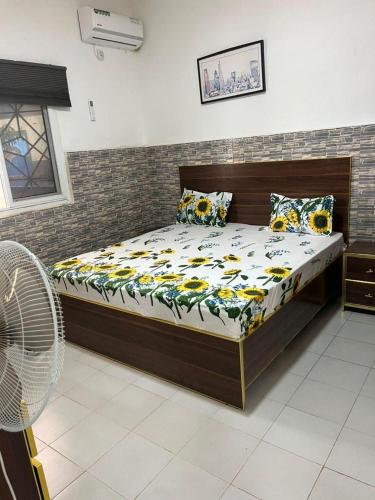 a bedroom with a bed in a room at Sendou Cabano Villa Retreat in Siendou