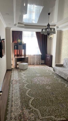 Ένα ή περισσότερα κρεβάτια σε δωμάτιο στο Apartment elit Bishkek