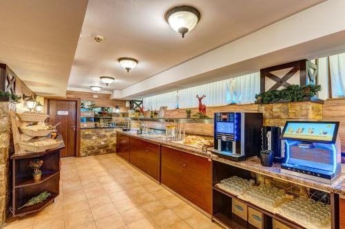 Kuchyň nebo kuchyňský kout v ubytování Dream View Apartments