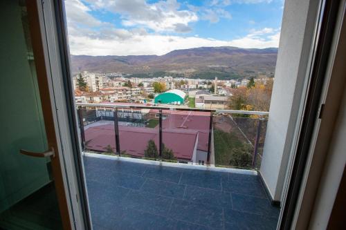 a view of a city from a balcony at Luxury Apartments Valentino in Ohrid